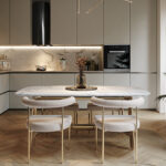 Interno moderno e luminoso di un appartamento, con cucina elegante e zona pranzo.