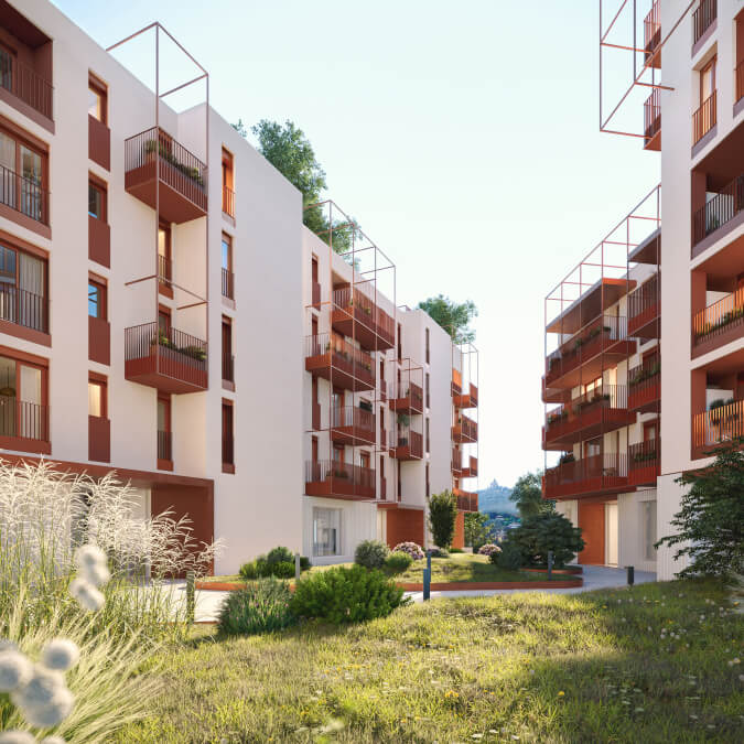 Vista degli edifici residenziali moderni con balconi, immersi nel verde del quartiere Navile.